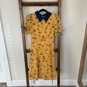 Ivy City Co Yellow Floral Midi Dress with Blue Collar and Bow Details